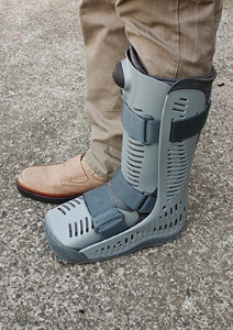 patient wearing a foot brace